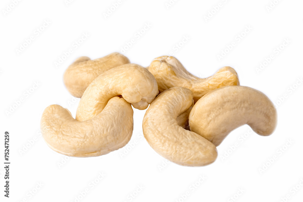 Raw cashew nuts on a white background. Raw cashew nuts on a white background.