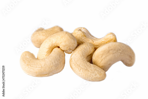 Raw cashew nuts on a white background.