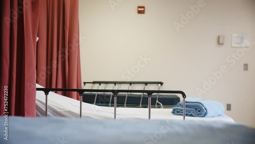 Tight Shot of Empty Hospital Beds with Slow Slide