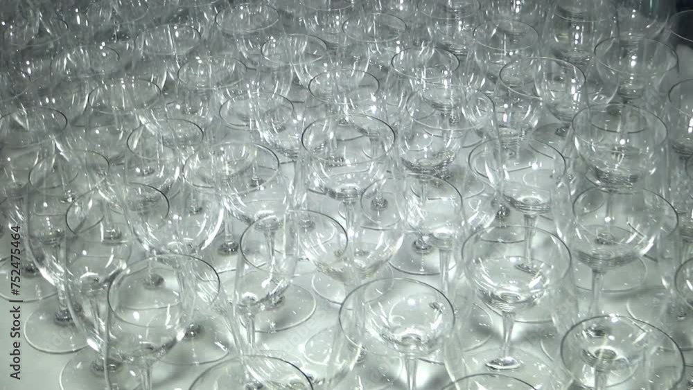 The wine glasses are also empty. Slow-motion, horizontal video footage of a glass of wine on a white tablecloth. Ready for party celebration holiday. The wine glasses are also empty. Slow-motion, horizontal video footage of a glass of wine on a white tablecloth. Ready for party celebration holiday.