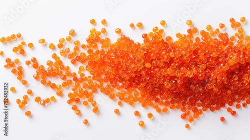A top-down view of red caviar on a white background, showcasing the exquisite taste and culinary refinement.