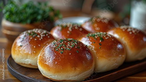 A close-up photo capturing the top of a bun cake adorned with sesame seeds. Revel in the soft texture and enticing aroma, a visual treat for bakery enthusiasts