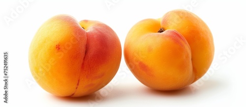 Fresh ripe peaches on clean white background surface, healthy organic fruits concept