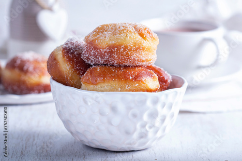 Obraz na płótnie Donuts with sugar and cinnamon served with cocoa. Traditional dessert for Carnival. w salonie