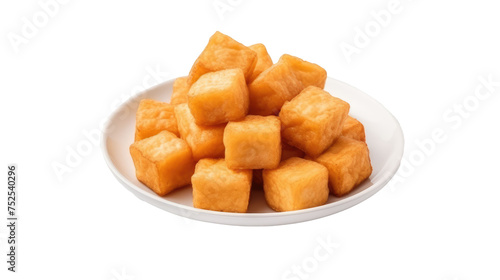 Plate of fried tofu cubes isolated on transparent a white background
