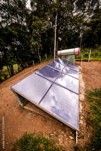 small solar heater with solar panels installed in rural areas of Brazil careless and precarious equipment