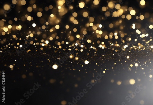 Black festive background Abstract scattering of gold sparkles on black Holiday backdrop selective focus Glowing particles falling on black background