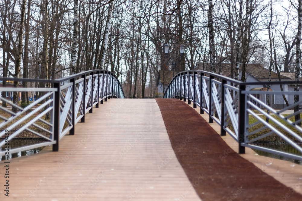 Walking Bridge Over a River