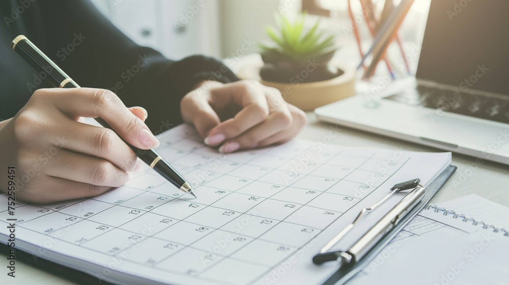 Business concept. The manager is planning and calculating. Manager prepares timetable. Business concept. The manager is planning and calculating. Manager prepares timetable.