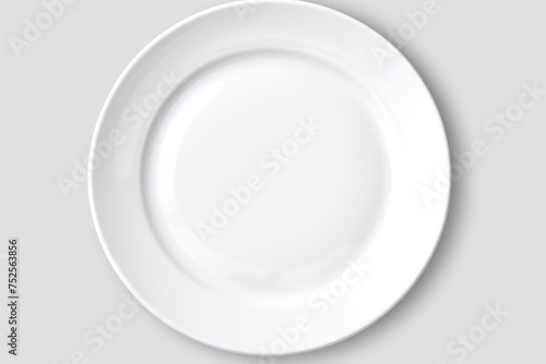 White plate with silver fork and knife on top. Perfect for restaurant menus or food blogs