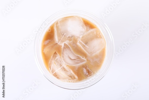 Plastic cup of fresh iced coffee isolated on white, top view