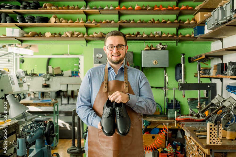 Traditional shoemaker proudly presents handmade shoes Traditional shoemaker proudly presents handmade shoes