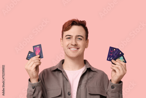 Young man with credit cards...