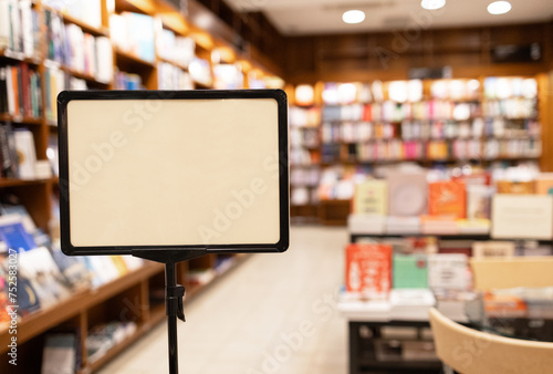 Empty signage board inside a cozy bookstore photo