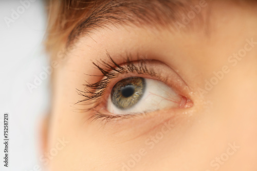 Young woman with green eyes...