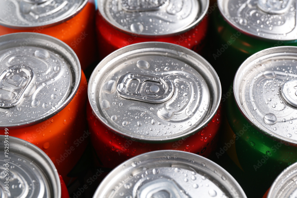 Energy drinks in wet cans, closeup. Functional beverage Energy drinks in wet cans, closeup. Functional beverage