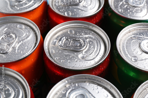 Energy drinks in wet cans  closeup. Functional beverage