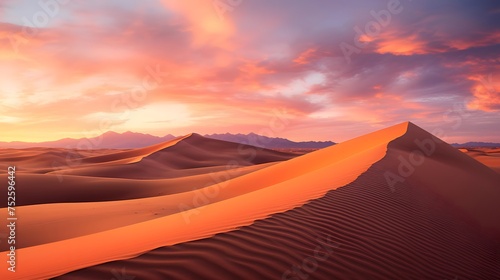 Dunes in the desert at sunset. Panoramic view.