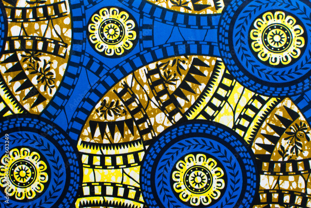top view of blue ankara fabric, flatlay of nigerian wax cloth with designs, spread out blue ankara material top view of blue ankara fabric, flatlay of nigerian wax cloth with designs, spread out blue ankara material