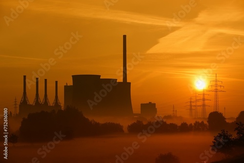 Gersteinwerk power station and high-voltage pylons at sunrise, Werne-Stockum, North Rhine-Westphalia, Germany, Europe