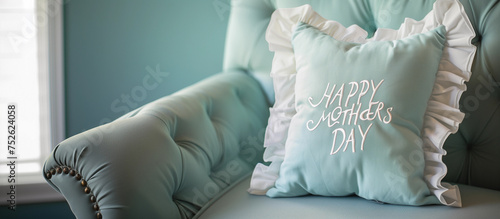 Happy Mothers Day light pastel blue handmade ruffle cushion sofa with handstitched embroidery word white eco crafting mom pillow in loungeroom home modern lux chic campaign craft blog copy space text
 photo