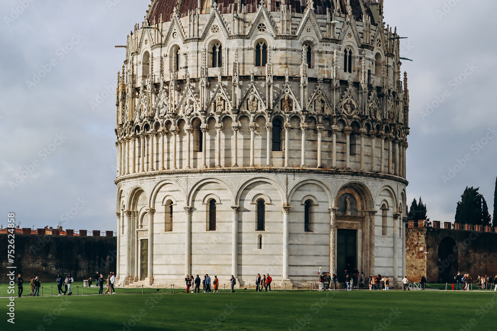 Pisa, Italy - 30 December 2023: The Pisa Baptistery of St. John, a Roman Catholic ecclesiastical building in Pisa, Italy.
