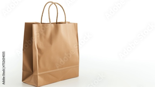 Isolated paper shopping bag on plain background.