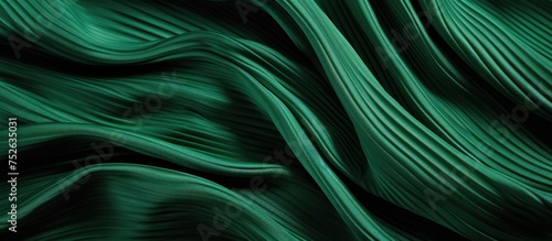 A vibrant green background featuring undulating wavy lines, resembling a textured silk corrugated fabric. The lines create a dynamic and visually appealing pattern that adds depth and movement to the
