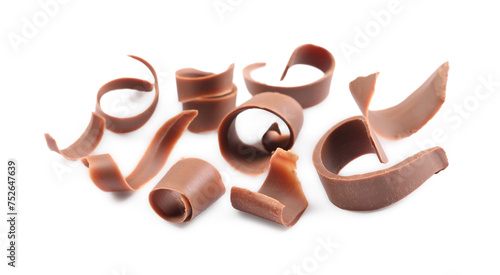 Many delicious chocolate shavings isolated on white