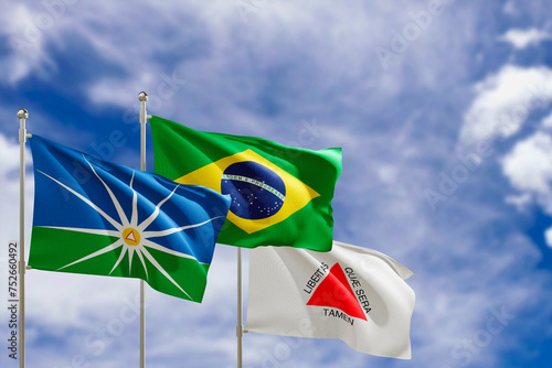 Official flags of the country Brazil, state of Minas Gerais and city of Uberlandia. Swaying in the wind under the blue sky. 3d rendering