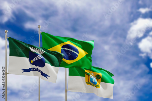 Official flags of the country Brazil, state of Rio Grande do Norte and city of Natal. Swaying in the wind under the blue sky. 3d rendering