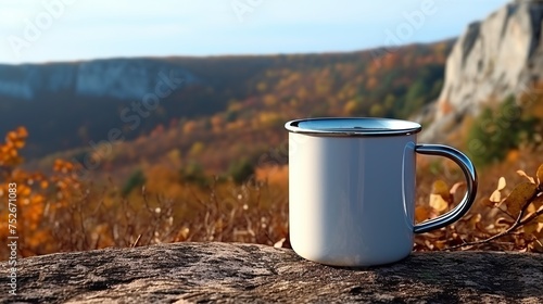 cup on top of hill with mountain background