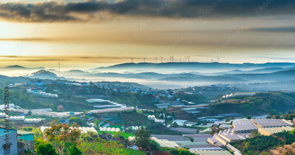 The morning landscape in the valley Da Lat, Vietnam with fog covered and sunrise background is so blurry, so beautiful and peaceful