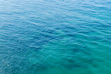 Blue sea water surface texture background. Top view of the sea.