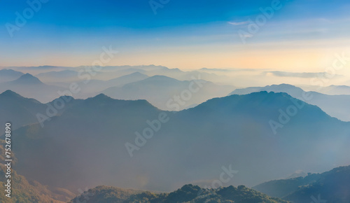 Beautiful landscape of mountain and fog in the morning at Doi Ang Khang, Chiang Mai, Thailand photo