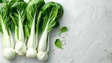 Organic fresh bok choy or pak choy in a white surface with a big space for text or product and a top view, Generative AI.