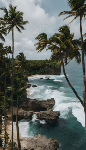 Tropical coastline with palm trees overlooking rocky cliffs and turquoise sea waves.
