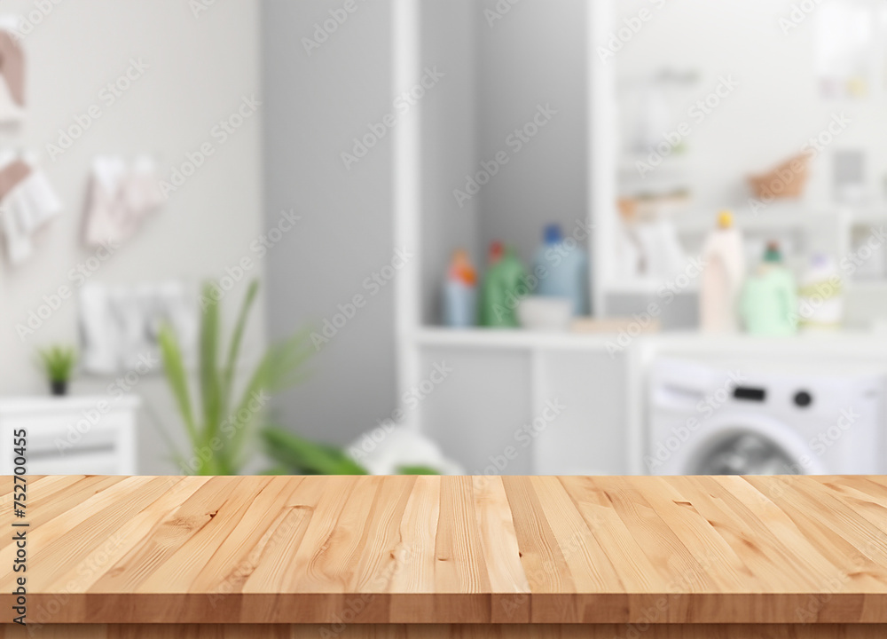 Wood table for display products on background of blurred laundry room Wood table for display products on background of blurred laundry room