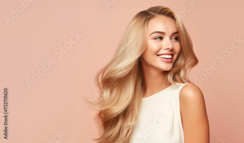Blonde woman with flowing hair, beauty portrait.