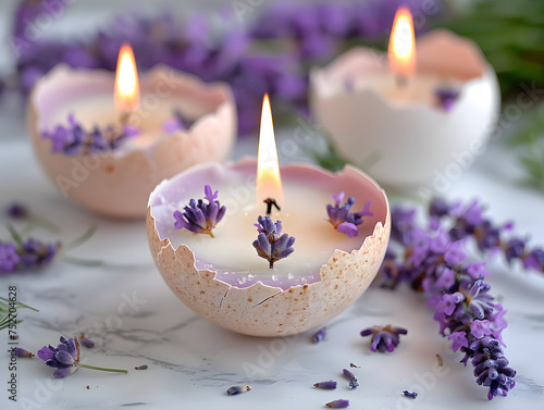Three lavender eggshell candles on a marble table, with vivid purple flowers and soft lighting, Spa and wellnes relax concept