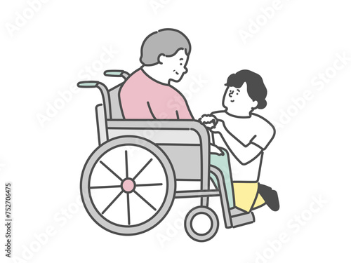 女性介護士と車椅子に乗った高齢女性