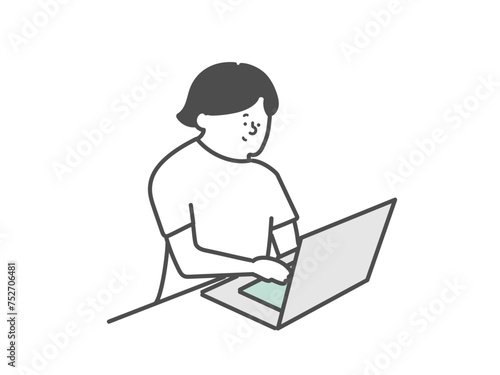 パソコンを使用する女性介護士