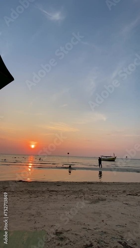 sunset on the beach jepara indonesia photo
