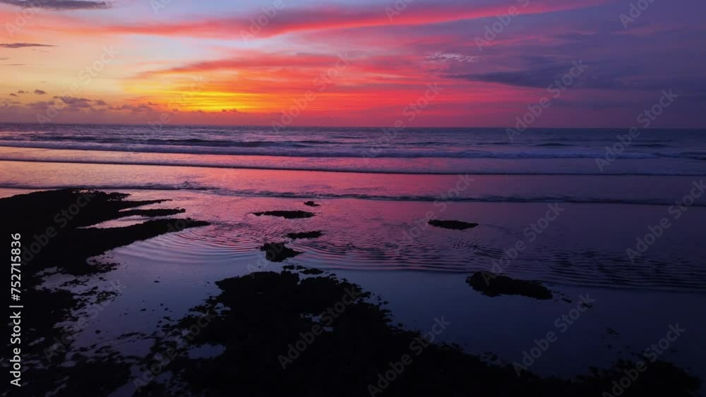 Aerial shot of sunset in Uluwatu beach. Uluwatu beach has the best sunsets in Bali. Aerial shot of sunset in Uluwatu beach. Uluwatu beach has the best sunsets in Bali.