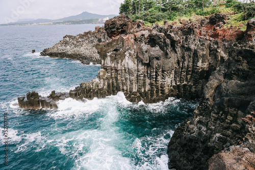 Jusangjeolli cliffs with basalt columns details, Jeju island, South Korea. photo