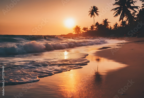 Tropical beach sunset with waves and palm tree silhouettes.