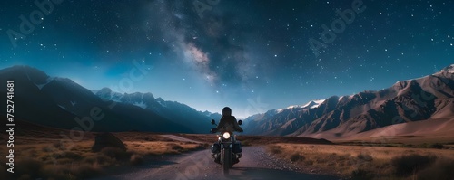 Motorcycle embarks on nocturnal adventure through mountainous terrain under starry sky. Concept Adventure, Night Photography, Motorcycles, Mountains, Starry Sky photo