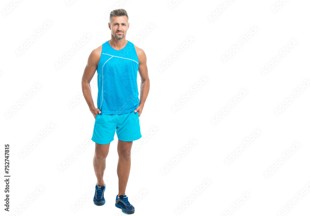 full length of athlete smile, copy space. athlete wearing sport wear standing alone. male sport athlete pose on studio. sport athlete with fit body isolated against white. Sport and healthy lifestyle full length of athlete smile, copy space. athlete wearing sport wear standing alone. male sport athlete pose on studio. sport athlete with fit body isolated against white. Sport and healthy lifestyle