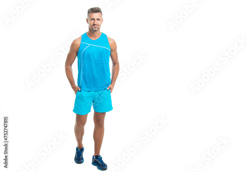 full length of athlete smile, copy space. athlete wearing sport wear standing alone. male sport athlete pose on studio. sport athlete with fit body isolated against white. Sport and healthy lifestyle © be free