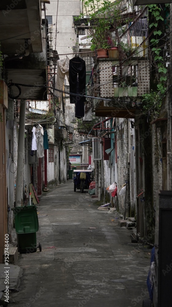 Fototapeta premium Asian empty back alley street covered with balconies